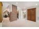 Bonus room featuring brick accent wall, closet, and desk area at 937 E Rock Springs Ne Rd, Atlanta, GA 30306