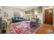 Cozy living room with ample seating, a large rug, and stylish decor at 937 E Rock Springs Ne Rd, Atlanta, GA 30306