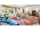 Bright living room with hardwood floors, large window, and ample seating at 937 E Rock Springs Ne Rd, Atlanta, GA 30306