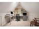 Office under eaves with pitched ceiling, custom shelving and plenty of light at 937 E Rock Springs Ne Rd, Atlanta, GA 30306