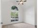 Bright bedroom boasts vaulted ceilings and a large window for natural light at 103 St Albans Way, Peachtree City, GA 30269