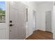 Inviting entry with hard wood floors, light walls and large front door at 103 St Albans Way, Peachtree City, GA 30269