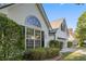 Bright one-story home with an attached garage and meticulously maintained landscaping at 103 St Albans Way, Peachtree City, GA 30269