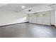A spacious garage with a clean epoxy floor and an automatic door at 103 St Albans Way, Peachtree City, GA 30269