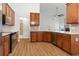 Updated kitchen with stainless steel appliances, hardwood floors, and lots of room for cooking at 103 St Albans Way, Peachtree City, GA 30269