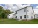 Backyard boasts a lush lawn and stylish home exterior at 1518 Gatekeeper Ter, Marietta, GA 30066