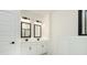 Elegant bathroom features dual sinks with modern fixtures and white cabinets at 1518 Gatekeeper Ter, Marietta, GA 30066