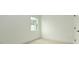 A bedroom with carpet and a view to the outside at 1518 Gatekeeper Ter, Marietta, GA 30066
