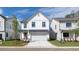 Charming two-story home with white siding, black trim, and a well-manicured front lawn at 1518 Gatekeeper Ter, Marietta, GA 30066
