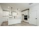 Modern kitchen featuring white cabinets, an island with seating, and stainless steel appliances at 1518 Gatekeeper Ter, Marietta, GA 30066