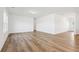 Spacious living room with new wood flooring and bright white walls at 2109 Boxwood Se Cir, Conyers, GA 30094
