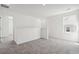 Bright loft space featuring neutral carpet and white walls, perfect for additional living space at 2109 Boxwood Se Cir, Conyers, GA 30094
