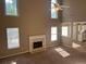 This living room features a fireplace, lots of natural light and carpet flooring at 3334 Rockmill Dr, Ellenwood, GA 30294