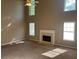 This living room features tall ceilings, many windows and a fireplace at 3334 Rockmill Dr, Ellenwood, GA 30294