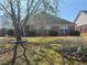 Charming backyard with manicured landscaping and a sunroom at 1365 Jubilee Ln, Mcdonough, GA 30253