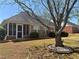 Backyard view of home and enclosed patio at 1365 Jubilee Ln, Mcdonough, GA 30253