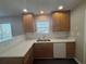 Bright kitchen featuring white countertops and stainless steel sink at 1365 Jubilee Ln, Mcdonough, GA 30253