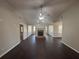 Bright living room boasts dark hardwood floors, fireplace, and ample natural light at 1365 Jubilee Ln, Mcdonough, GA 30253