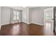 Well-lit bedroom with hardwood floors and a spacious closet at 218 Midvale Ne Dr, Atlanta, GA 30342
