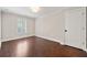 Bedroom with hardwood floors, natural light, and a closet at 218 Midvale Ne Dr, Atlanta, GA 30342