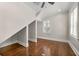 Versatile bonus room featuring hardwood floors, recessed lighting, and a window overlooking the yard at 218 Midvale Ne Dr, Atlanta, GA 30342