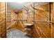 Cedar walk-in closet featuring metal shelving, rods, and carpet flooring at 218 Midvale Ne Dr, Atlanta, GA 30342