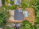 Aerial view featuring the home's backyard pool and patio area at 3154 N Druid Hills Rd, Decatur, GA 30033