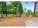 Spacious backyard featuring a well-manicured landscape with seating, privacy fence, and peaceful atmosphere at 3154 N Druid Hills Rd, Decatur, GA 30033