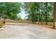 Expansive concrete backyard featuring a privacy fence offering ample space for various activities at 3154 N Druid Hills Rd, Decatur, GA 30033