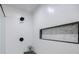Modern shower features geometric tile walls, a built-in shower niche, and a rainfall shower head at 3154 N Druid Hills Rd, Decatur, GA 30033