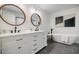 Elegant bathroom with double vanity, soaking tub, and stylish fixtures at 3154 N Druid Hills Rd, Decatur, GA 30033