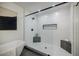 Sleek bathroom with soaking tub and glass-enclosed shower at 3154 N Druid Hills Rd, Decatur, GA 30033