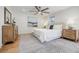 Well-lit bedroom with hardwood floors and neutral decor and ceiling fan at 3154 N Druid Hills Rd, Decatur, GA 30033