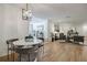 Open dining area adjacent to the living room features modern lighting and decor at 3154 N Druid Hills Rd, Decatur, GA 30033