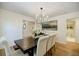 Dining room featuring a chandelier, neutral paint, and hardwood floors at 3154 N Druid Hills Rd, Decatur, GA 30033