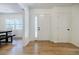 Bright entryway with wood floors and a view into an adjacent room at 3154 N Druid Hills Rd, Decatur, GA 30033