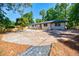 Charming single-story home with large parking pad and lush landscaping at 3154 N Druid Hills Rd, Decatur, GA 30033