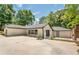 Charming single-story home with a spacious driveway and well-maintained landscaping at 3154 N Druid Hills Rd, Decatur, GA 30033