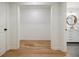 Hallway leads to the bathroom with modern vanity and fixtures at 3154 N Druid Hills Rd, Decatur, GA 30033