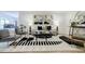Chic living room boasting modern decor, neutral paint, and hardwood floors at 3154 N Druid Hills Rd, Decatur, GA 30033