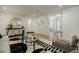 This living room features light hardwood floors, recessed lighting, and modern decor with open access to other areas at 3154 N Druid Hills Rd, Decatur, GA 30033