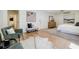 Bright bedroom boasts hardwood floors, ceiling fan, and a calming neutral color palette at 3154 N Druid Hills Rd, Decatur, GA 30033