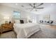 Bright bedroom boasts hardwood floors, ceiling fan, and a calming neutral color palette at 3154 N Druid Hills Rd, Decatur, GA 30033