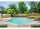 Relaxing backyard retreat featuring a refreshing in-ground pool perfect for entertaining and leisure at 3154 N Druid Hills Rd, Decatur, GA 30033