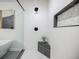 Shower with hexagon tile floor, built-in niche, and glass door at 3154 N Druid Hills Rd, Decatur, GA 30033