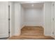 A spacious walk-in closet with hardwood floors featuring a light fixture at 3154 N Druid Hills Rd, Decatur, GA 30033