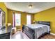 Bedroom with hardwood floors, a window, and a black bed frame at 3710 Burling Rdg, Lithonia, GA 30038