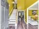Inviting foyer with hardwood floors and a staircase leading to the upper level at 3710 Burling Rdg, Lithonia, GA 30038