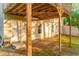 Exterior view of walkout basement, featuring door and windows beneath the deck at 4061 Preserve Trl, Snellville, GA 30039