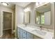 Stylish bathroom with double sinks, modern fixtures, and plenty of cabinet space at 4061 Preserve Trl, Snellville, GA 30039